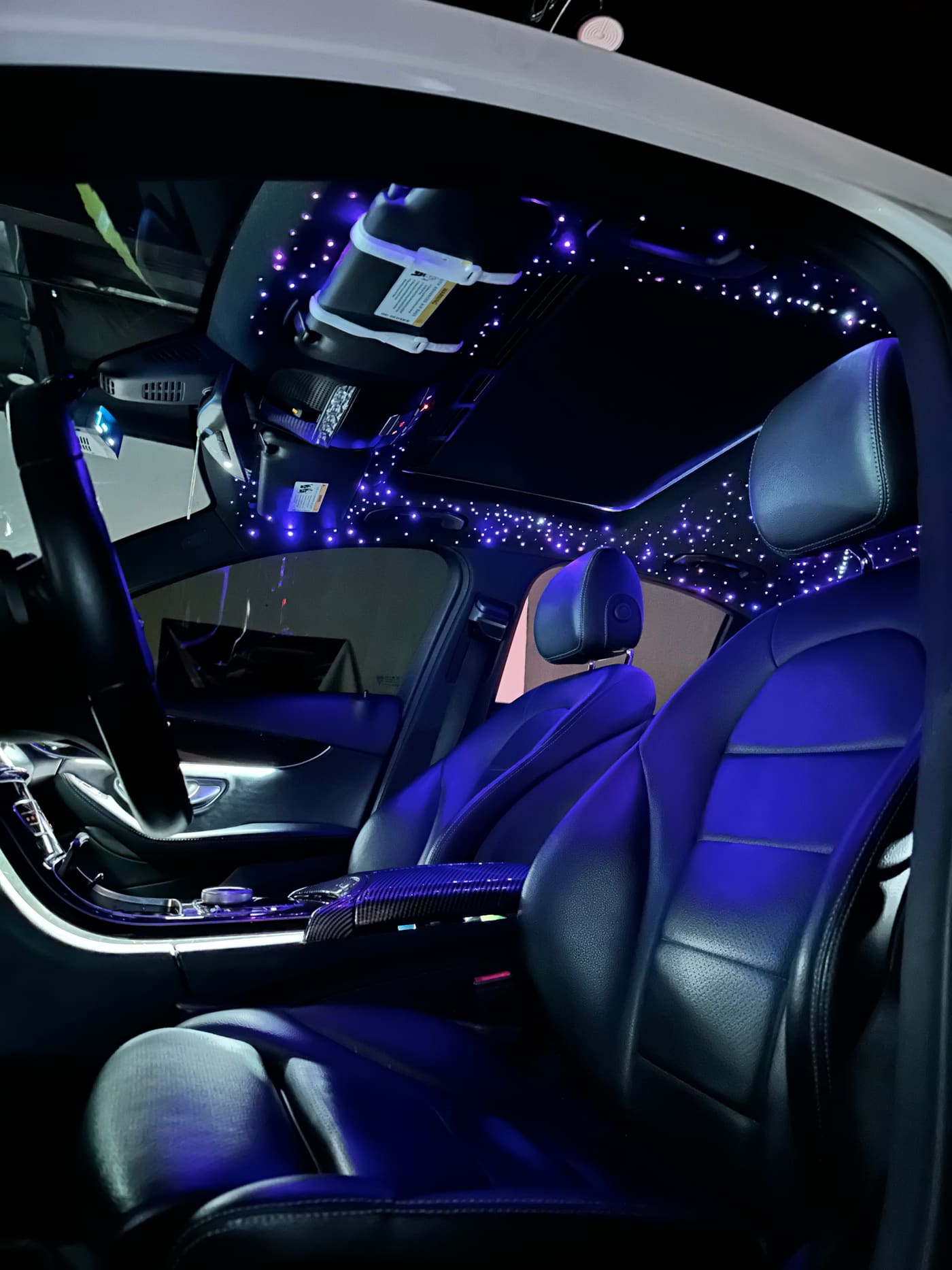 Star fibers wrapping the roof and pillars of a Mercedes cabin